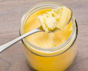 Embrace the Golden Morning Ritual: Harnessing the Power of Melted Ghee and Warm Water for Wellness